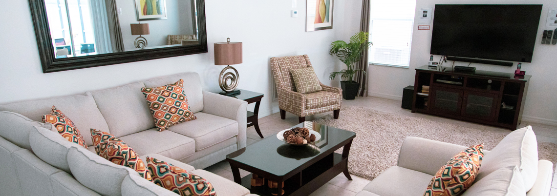 family living area showing seating and TV
